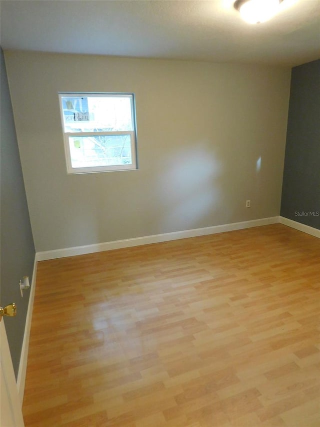 empty room featuring light hardwood / wood-style floors