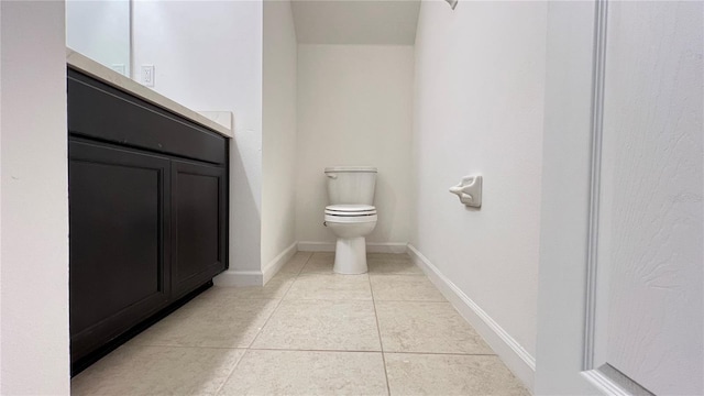 bathroom featuring tile patterned flooring and toilet