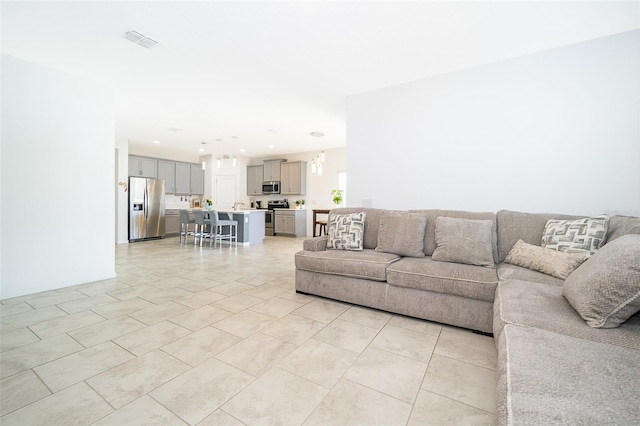 living room featuring light tile patterned flooring