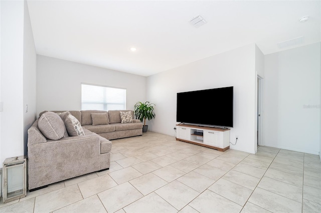 living room with light tile patterned flooring