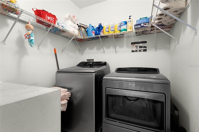 laundry room featuring washer and clothes dryer