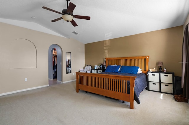 bedroom featuring light colored carpet, ceiling fan, and lofted ceiling