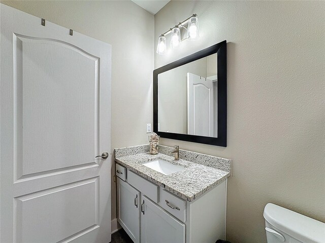 7959 Delwin Ln, Kissimmee, FL 34747 - bathroom with vanity and toilet