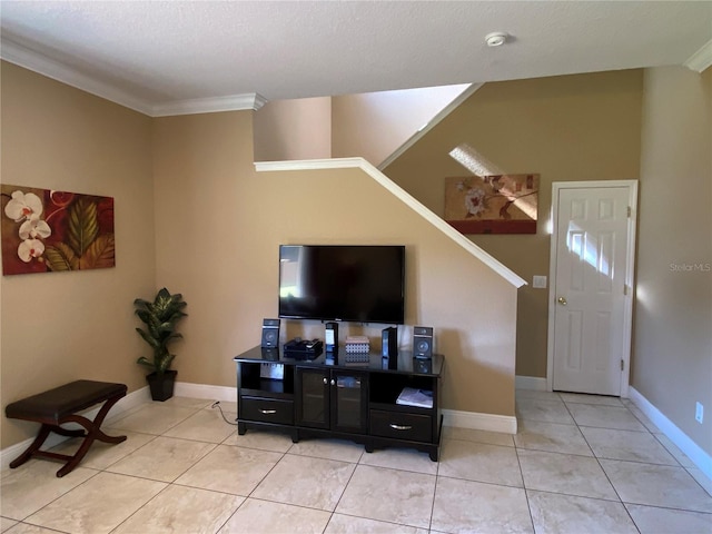 tiled living room featuring a textured ceiling and crown molding