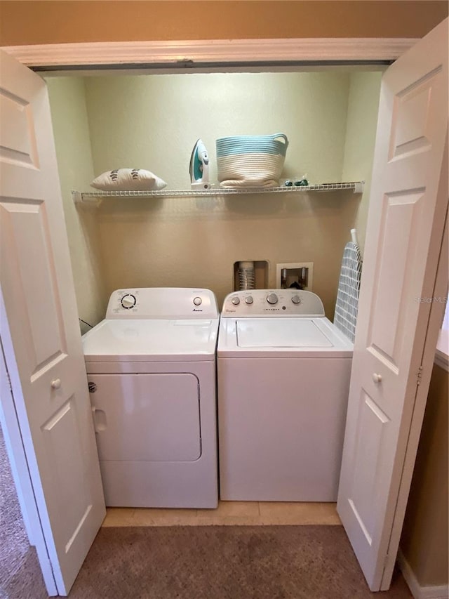 laundry area featuring washer and clothes dryer