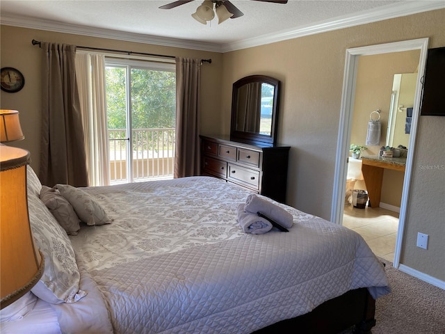 bedroom with ceiling fan, light colored carpet, ornamental molding, and a textured ceiling