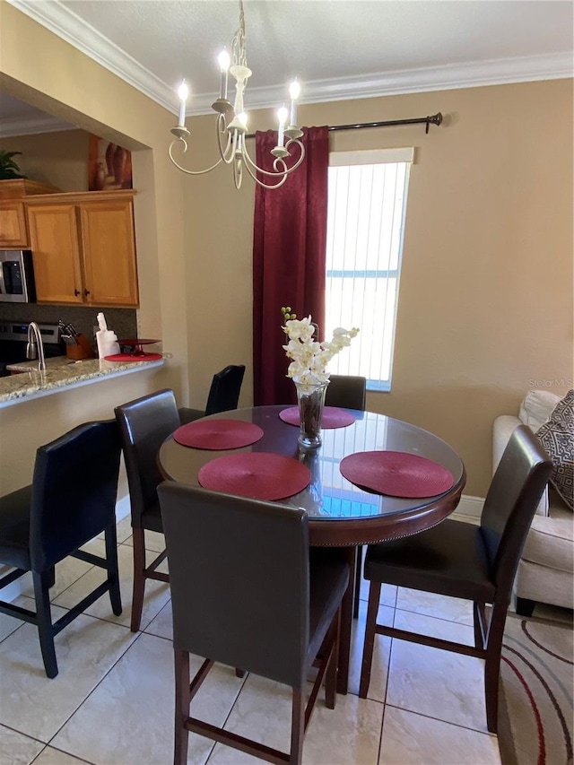 dining room featuring crown molding, light tile patterned flooring, and a notable chandelier