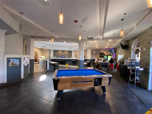 playroom featuring beamed ceiling, dark tile patterned floors, ornate columns, and pool table