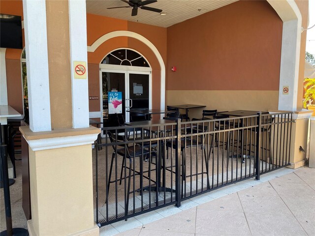 467 La Mirage St, Davenport, FL 33897 - entrance to property with stucco siding and ceiling fan
