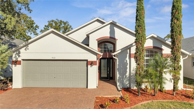 view of front of home with a garage