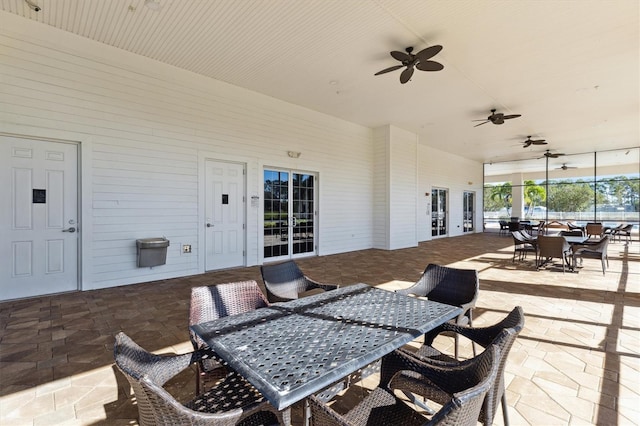 view of patio featuring ceiling fan and french doors