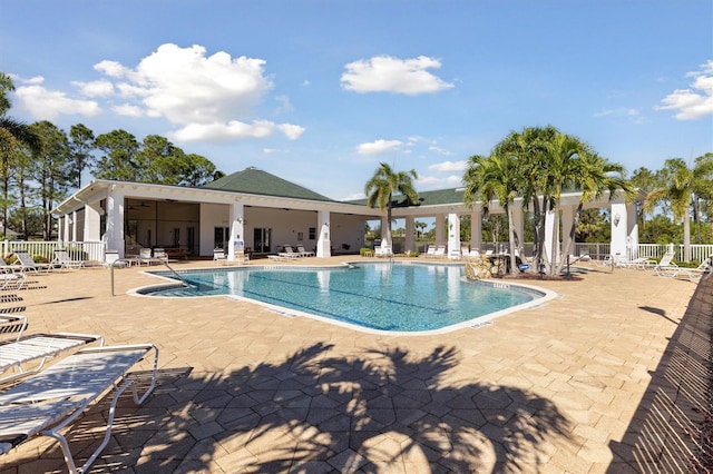 view of swimming pool with a patio area