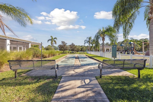 surrounding community featuring a yard