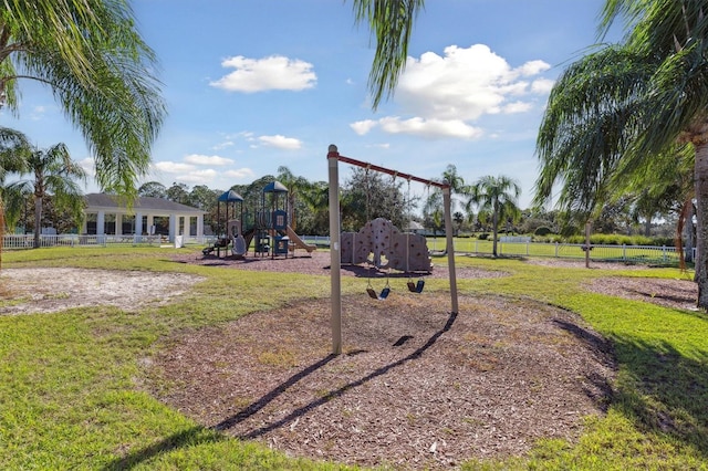 view of community featuring a yard and a playground