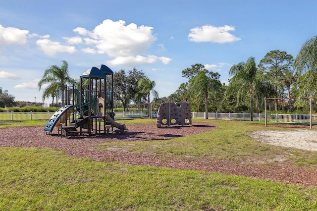 view of jungle gym featuring a yard