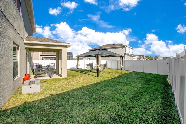 view of yard with a gazebo and a patio