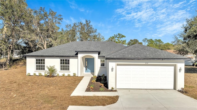 ranch-style home with a garage