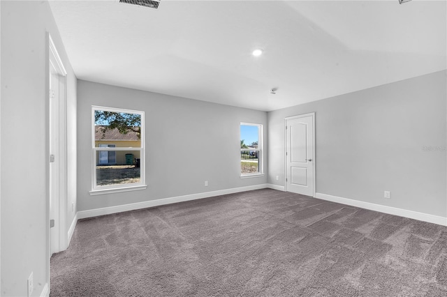 view of carpeted spare room