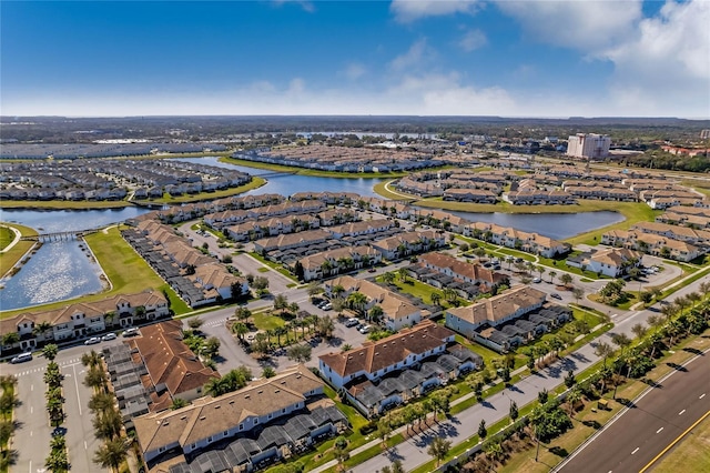 drone / aerial view with a water view