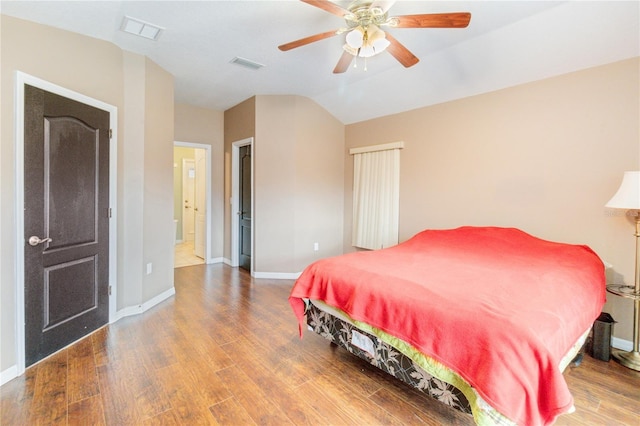 bedroom featuring wood-type flooring, lofted ceiling, and ceiling fan