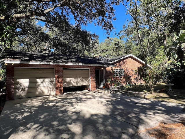 ranch-style home with a garage