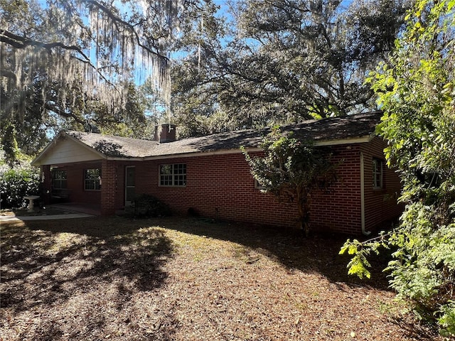 rear view of house featuring a patio area