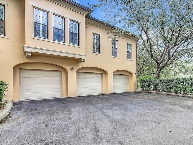 exterior space with a garage