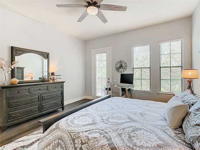 bedroom with access to outside, multiple windows, ceiling fan, and hardwood / wood-style floors