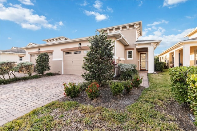 view of front of property featuring a garage