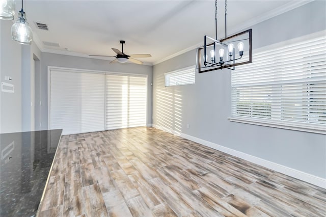 interior space with ceiling fan