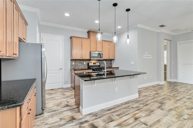 kitchen with light brown cabinetry, crown molding, light hardwood / wood-style flooring, and stainless steel appliances