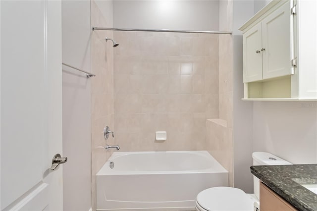 full bathroom with vanity, toilet, and tiled shower / bath