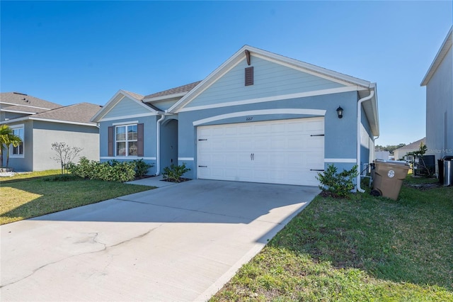 ranch-style house with a front lawn and a garage