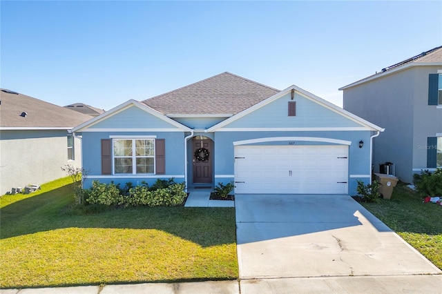 single story home with a front lawn and a garage