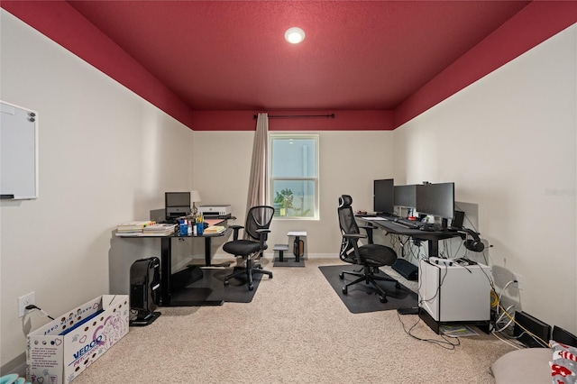 office area featuring carpet and a textured ceiling