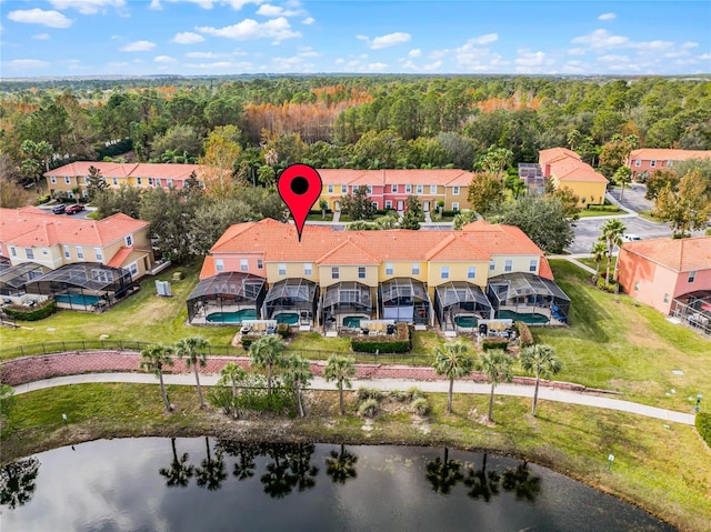 birds eye view of property featuring a water view