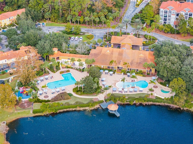 birds eye view of property featuring a water view