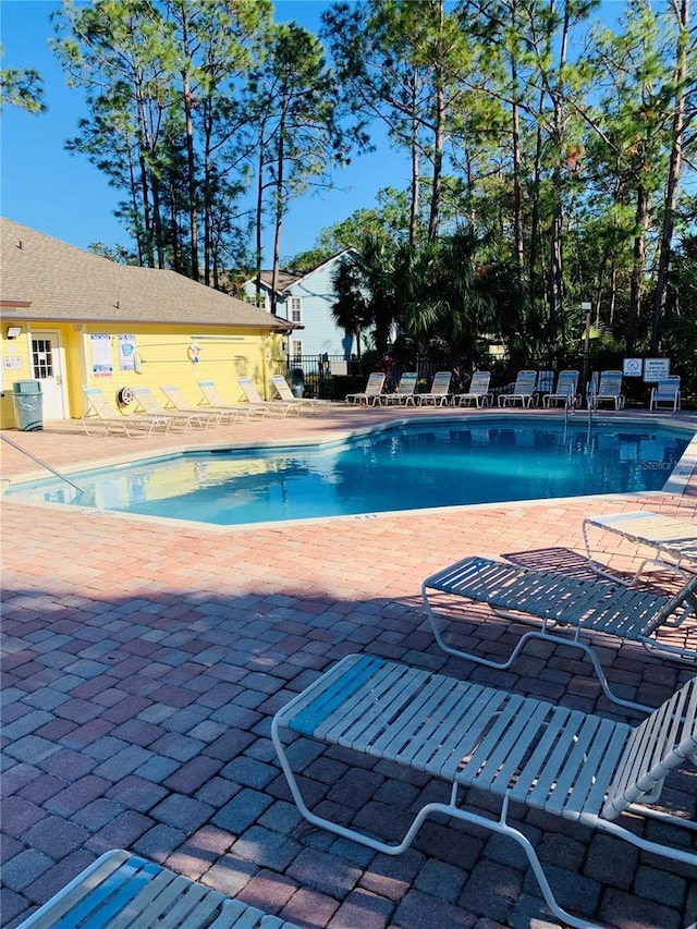 view of pool featuring a patio area