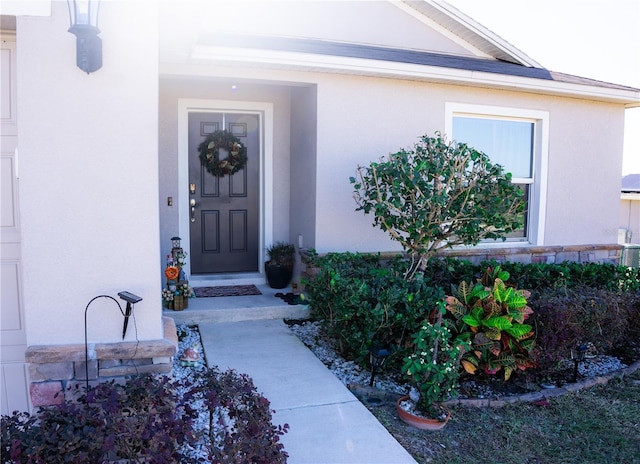 326 Dinner Lake Ct, Lake Wales, FL 33859 - entrance to property featuring stucco siding