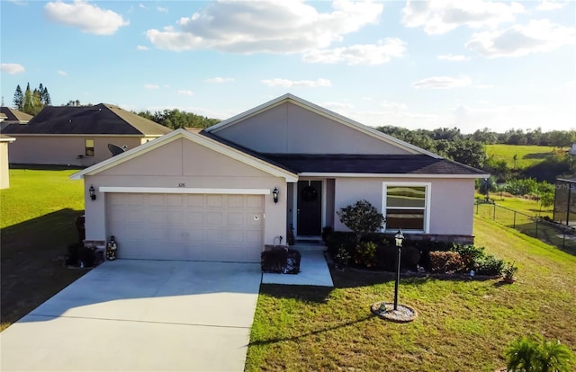 single story home featuring a front yard and a garage