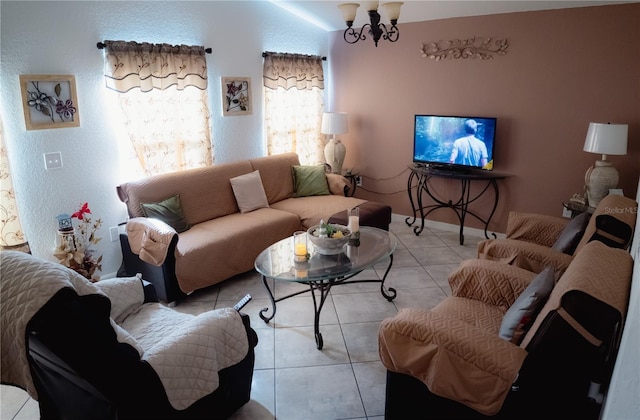326 Dinner Lake Ct, Lake Wales, FL 33859 - living room with light tile patterned floors and a chandelier