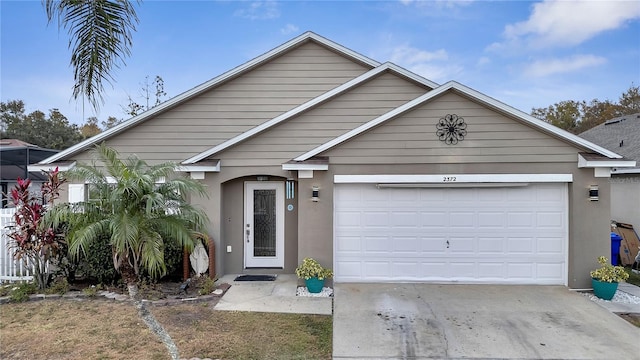 view of front of home with a garage