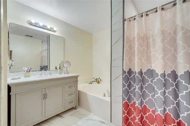 bathroom with vanity and independent shower and bath