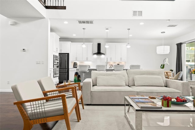 living room featuring light wood-type flooring