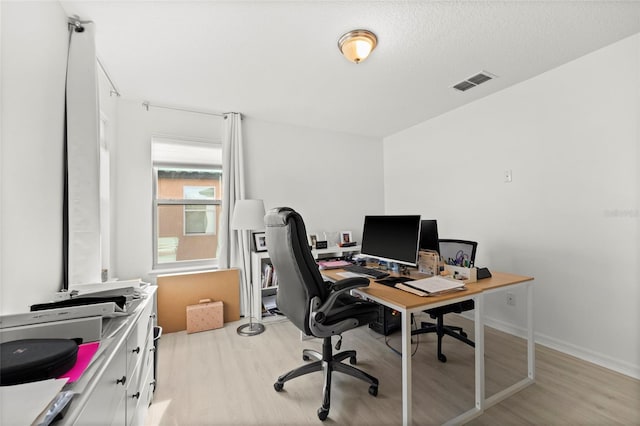 office featuring light hardwood / wood-style floors