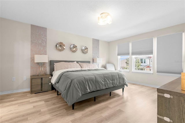 bedroom featuring light hardwood / wood-style flooring