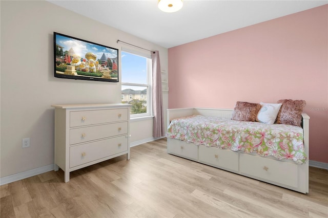 bedroom featuring light hardwood / wood-style floors