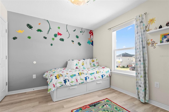 bedroom featuring light hardwood / wood-style flooring