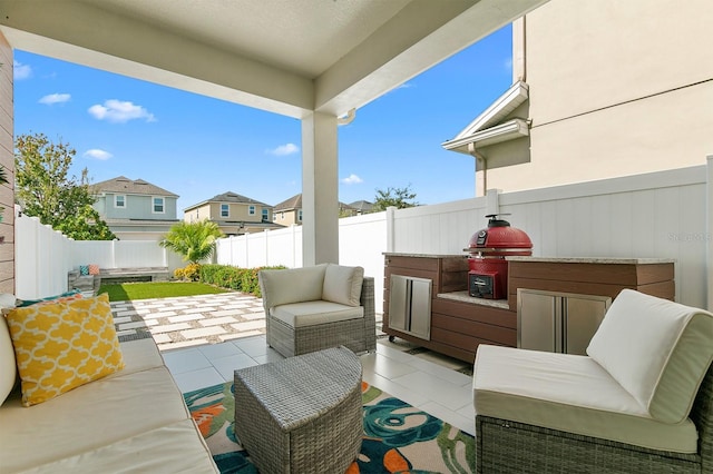 view of patio with a grill and exterior kitchen