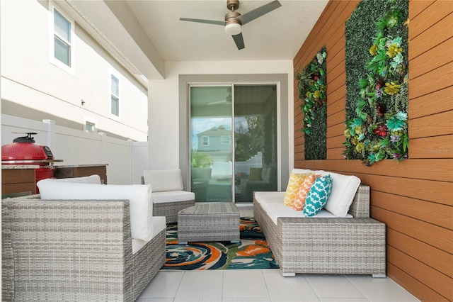 view of patio featuring ceiling fan